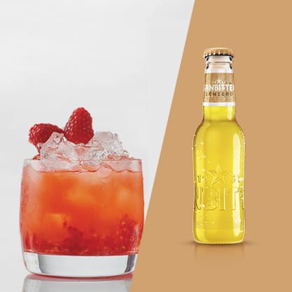 Cocktail con Sanbittèr Emozioni Zenzero e succo di lime e lamponi