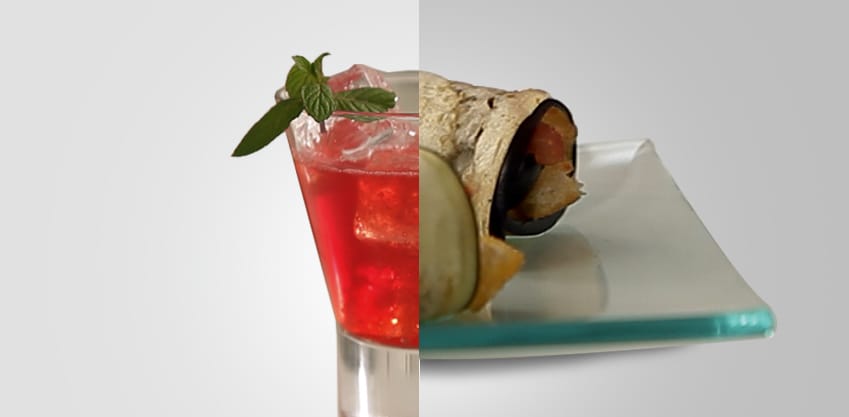 Rosso Fresh, il vero aperitivo Sanbittèr, accompagnato da rotoli di melanzane, un finger food classico e vivace